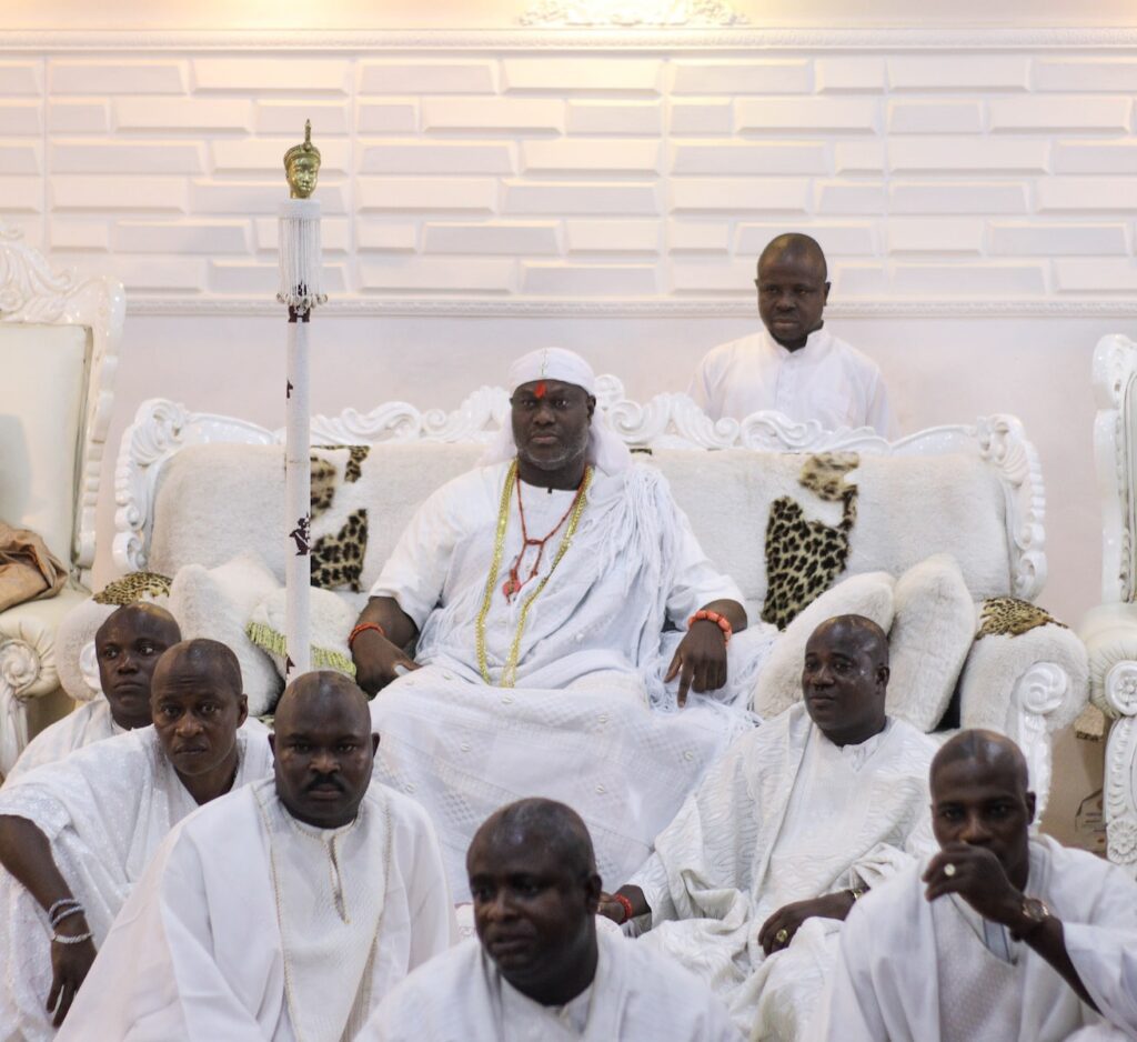 a group of men in white robes